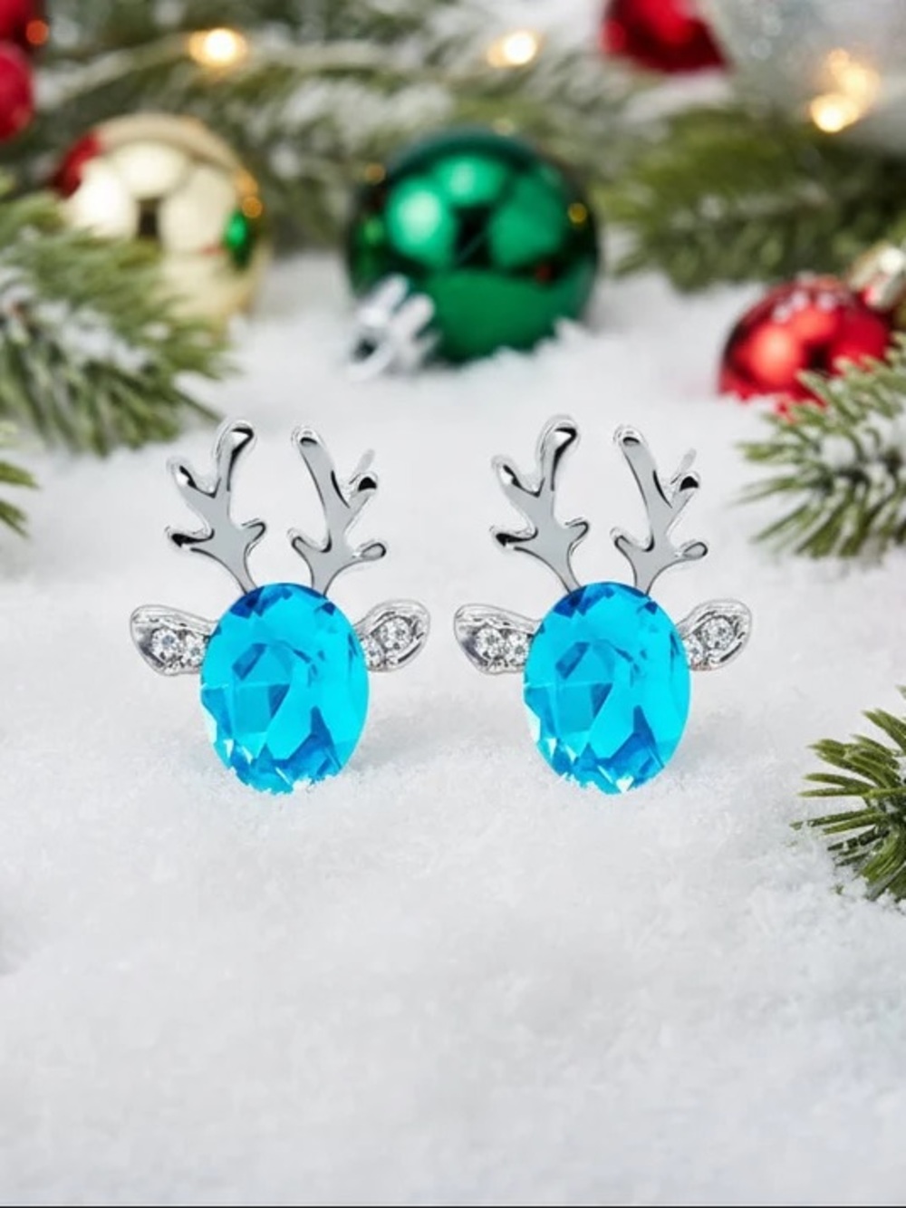 Silver Reindeer Stud Earrings with Bright Blue Crystal Accents